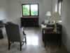 Living room.  Comfy chairs.  Floor not so comfy. (83,697 bytes)
